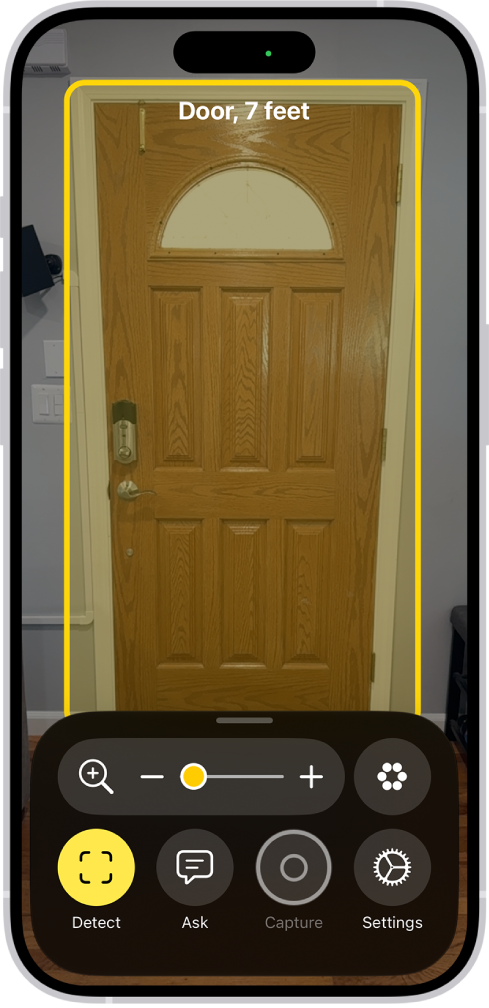 The Magnifier app is open and a door is being detected. A description shows how far away the door is.