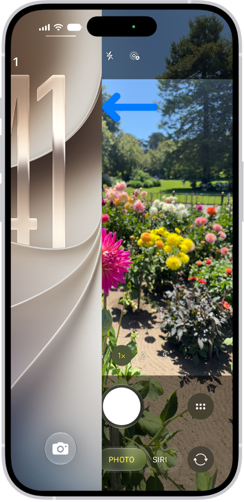 The iPhone screen showing the Lock Screen sliding to the left and the Camera open on the right side of the screen.