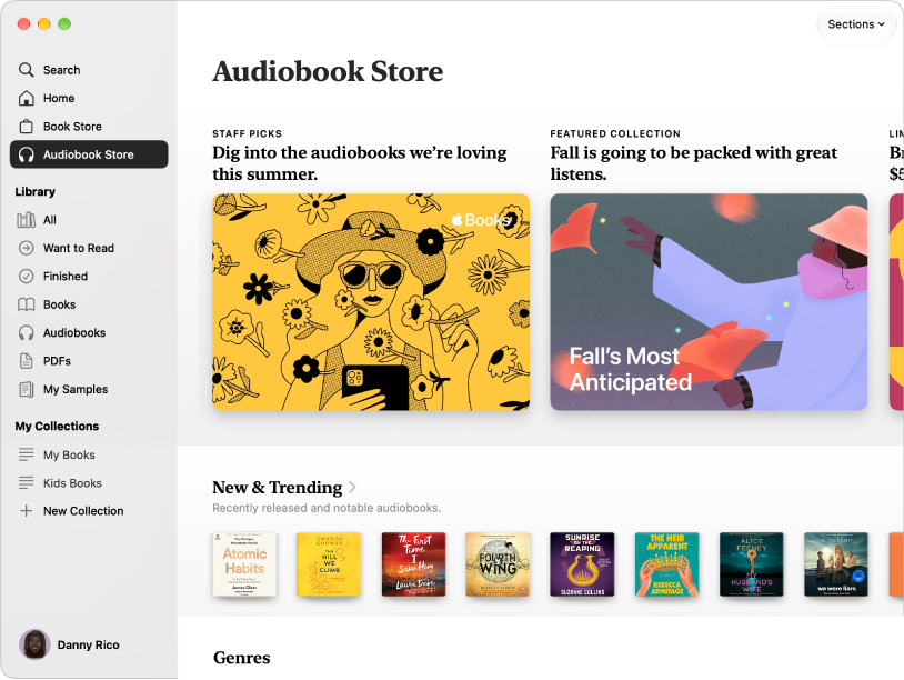 A Books app window showing the Audiobook Store selected in the sidebar, with categories of titles to the right including New & Trending.