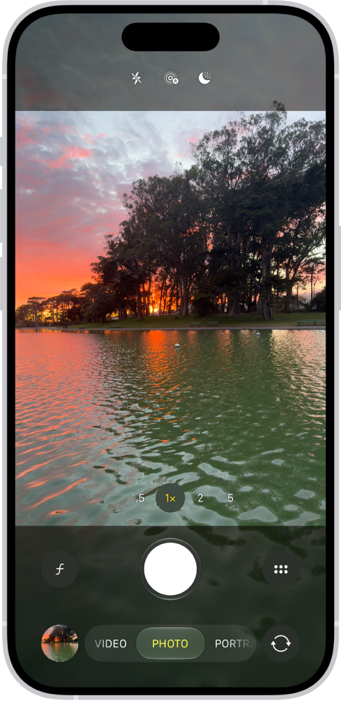 The Camera screen in Photo mode, with controls to capture a photo in low light.