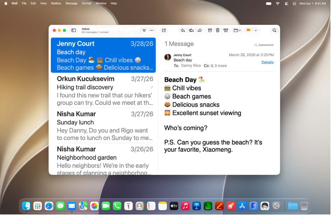 The Mail window is open on the desktop. Emails are displayed with large text.