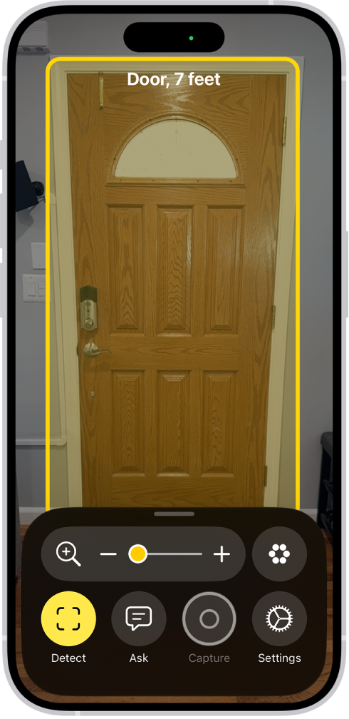 The Magnifier app is open and a door is being detected. A description shows how far away the door is.