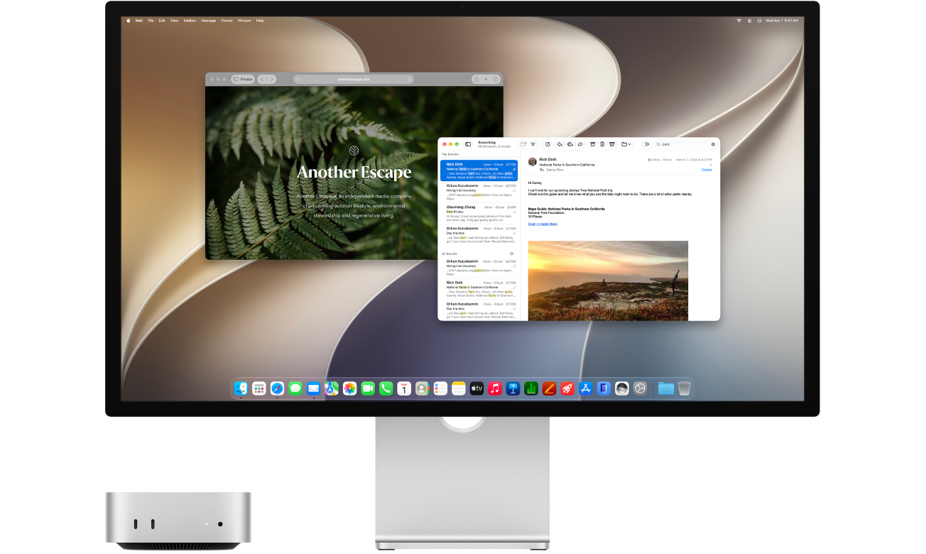 A Mac mini next to a display. The display has a Mail app window and a Safari app window open. 