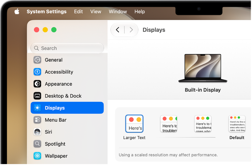 The System Settings window is open on the desktop. The display is using a lower resolution so user interface elements appear larger.