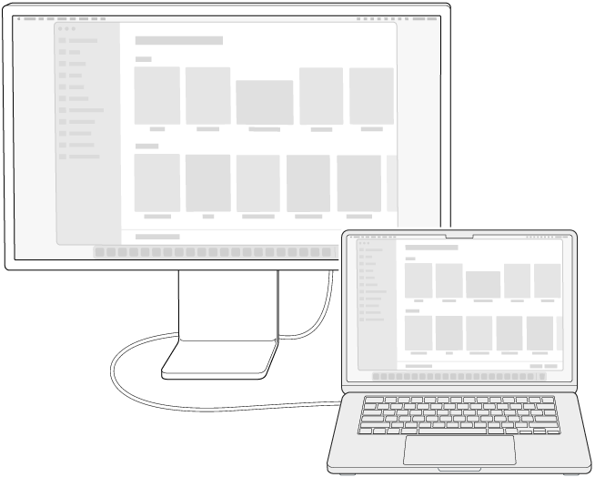 Um monitor conectado a um MacBook Air com a mesa espelhada em ambas as telas.