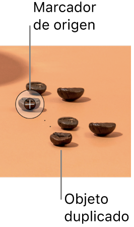 Foto de granos de café con un grano adicional duplicado con la herramienta “Clonar”.