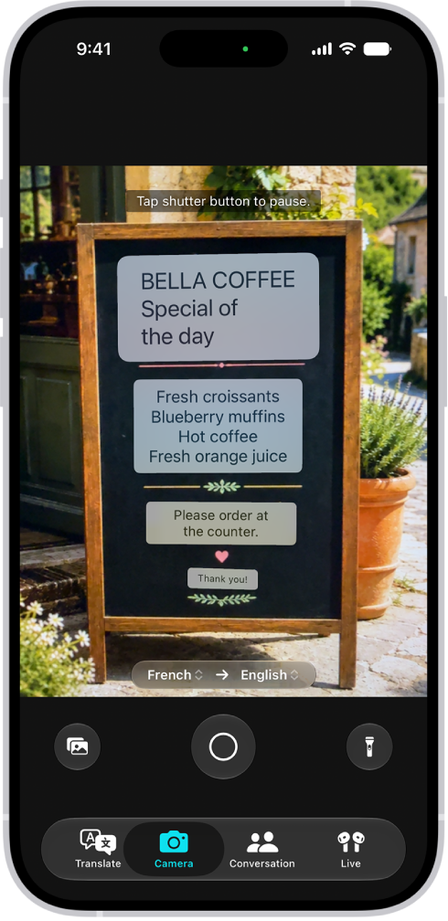 Kamera-välilehti, jolla näkyy englannista espanjaan käännetty ravintolan ruokalista.