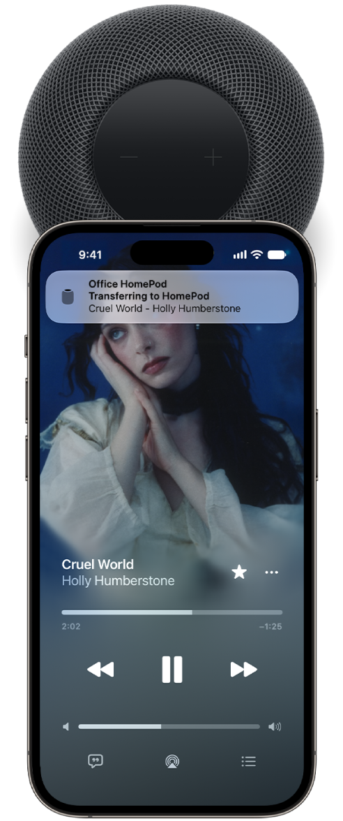 An iPhone positioned near the top of HomePod showing music being transferred.