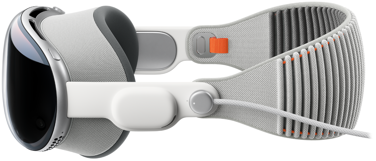 A side view of Apple&nbsp;Vision&nbsp;Pro, showing the battery connected.