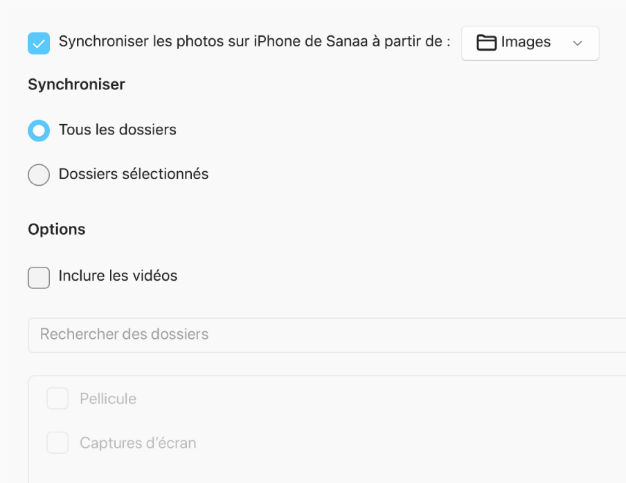 Les boutons radio « Tous les albums et photos » et « Albums sélectionnés » s’affichent avec les cases à cocher en dessous « Seulement les favoris », « Inclure les vidéos » et « Inclure automatiquement les photos de ».