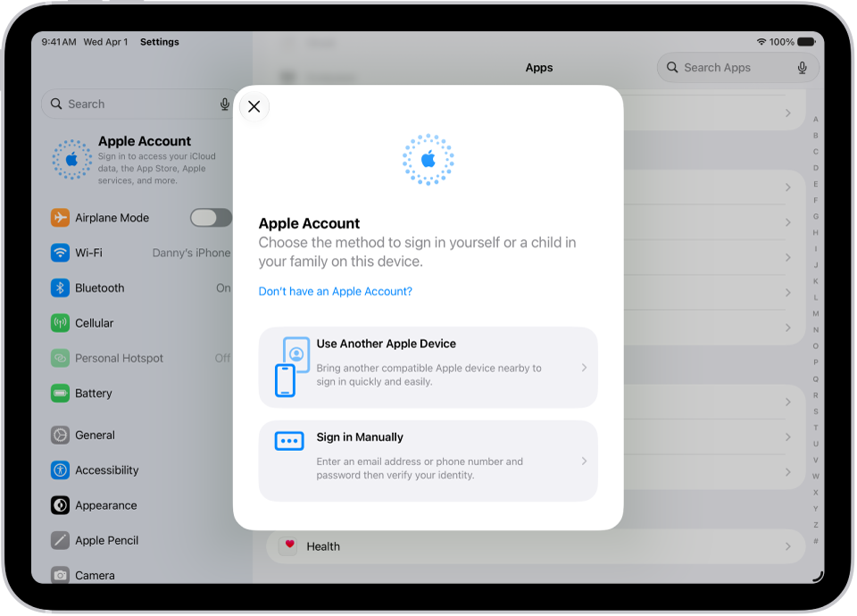 La app Configuración, con el cuadro de diálogo de iniciar sesión con la cuenta de Apple en el centro de la pantalla.