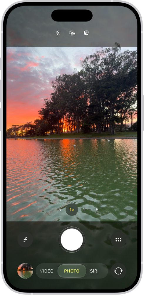 The Camera screen in Photo mode. Within the viewfinder is a night scene. Buttons for Night and Camera Controls mode appear in the top-right corner of the screen. At the bottom of the screen are, from left to right, the Photo and Video Viewer button, Video and Photo Mode, and the Camera Chooser Back-Facing button.