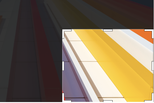 A crop box on layer with the Warp adjustment applied.