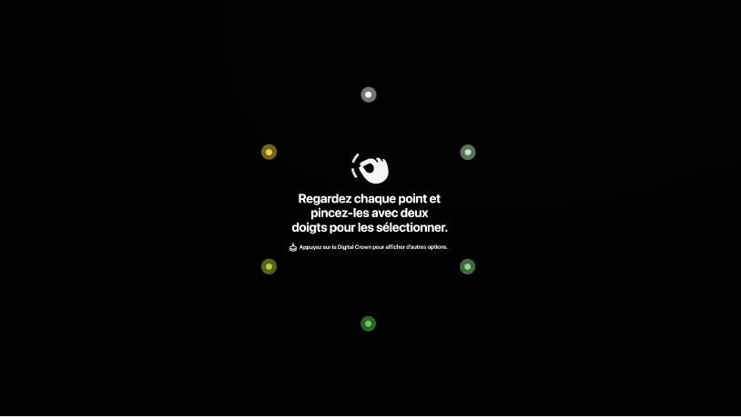 La vue de configuration des yeux, avec des instructions demandant de regarder chaque point et de rapprocher vos doigts pour le sélectionner ou d’appuyer sur la Digital&nbsp;Crown pour afficher plus d’options.