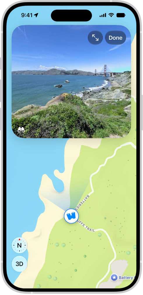 A moveable, 360-degree panoramic view appears above a map of the area marked in the Maps app. The Look Around icon overlaid on the map points in the direction of the view.