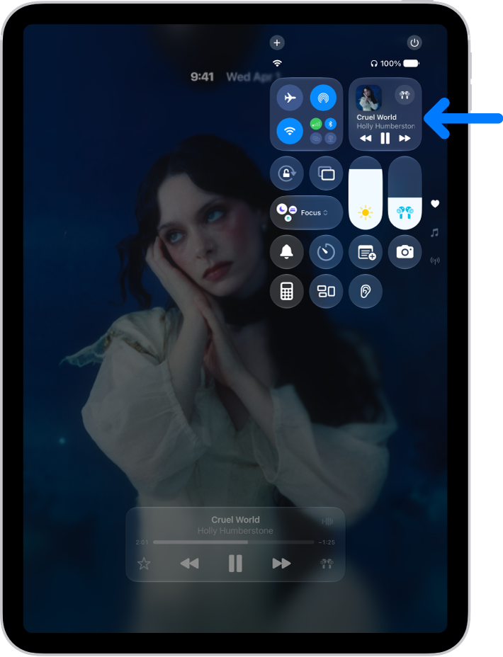 The iPad Control Center showing an arrow pointing to the audio card where you can control music from the Lock Screen or when using another app.