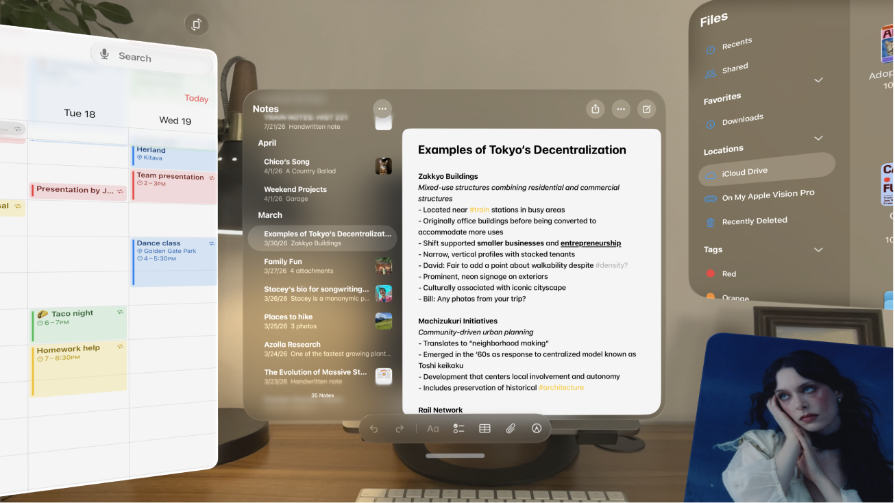 A user’s view on Apple&nbsp;Vision&nbsp;Pro, with several app windows visible.