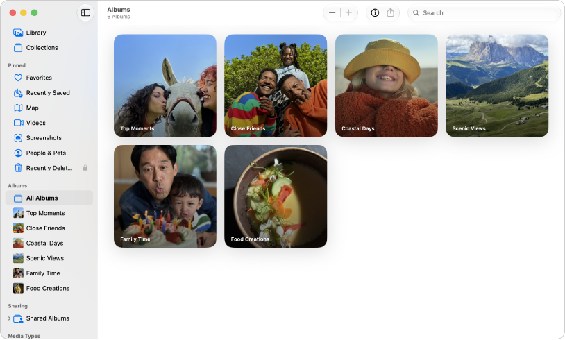 The Photos app window with All Albums selected in the sidebar and albums shown on the right.