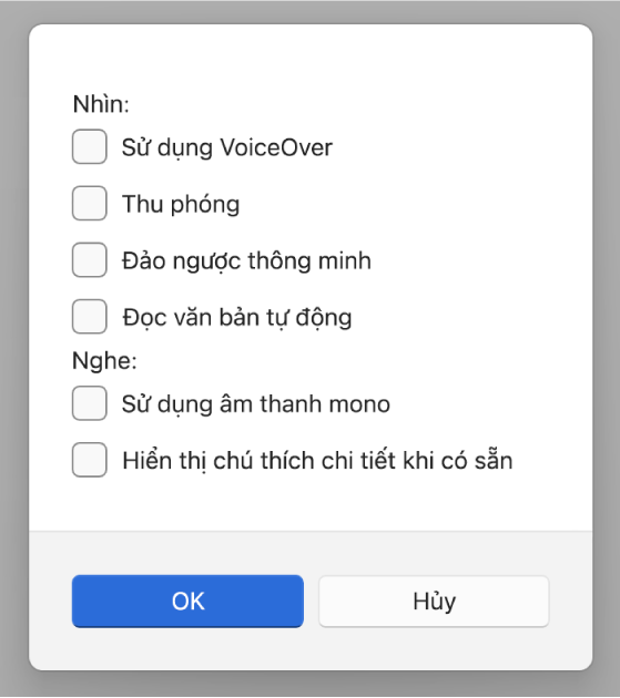 Các tính năng trợ năng trong ứng dụng Thiết bị Apple, đang hiển thị các tùy chọn cho Sử dụng VoiceOver, Thu phóng, Đảo ngược thông minh, Đọc văn bản tự động, “Sử dụng âm thanh mono” và “Hiển thị chú thích chi tiết khi có sẵn”.