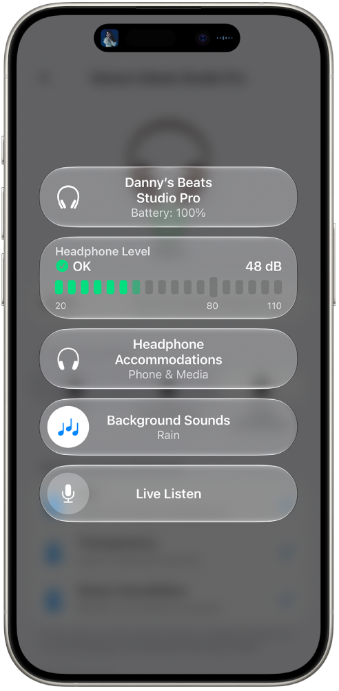 The Hearing Devices screen in Control Center. From top to bottom, it includes the Headphone Level in decibels, Headphone Accommodations, Background Sounds, and Live Listen for the connected Studio Pro headphones.