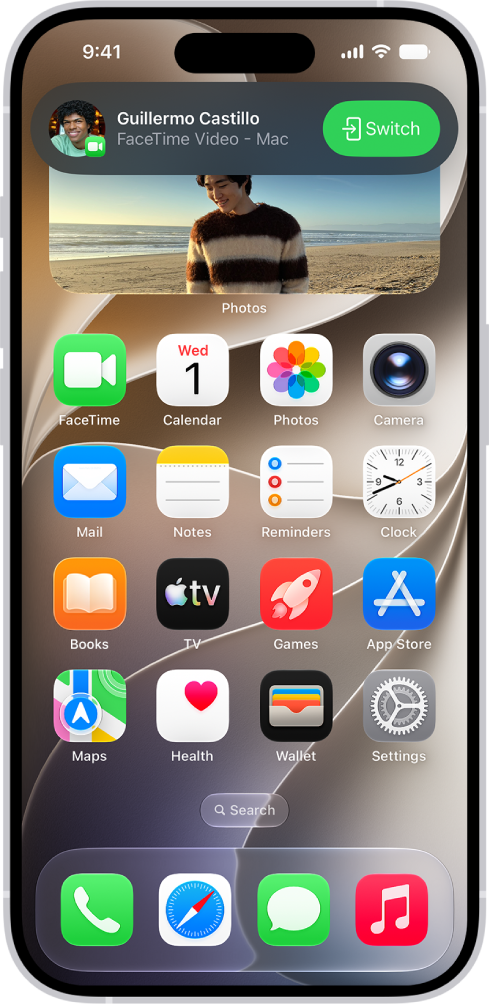 The iPhone Home Screen showing a FaceTime video call notification from an iPad at the top. Tap the Switch button to the right of the notification to move the call to your iPhone