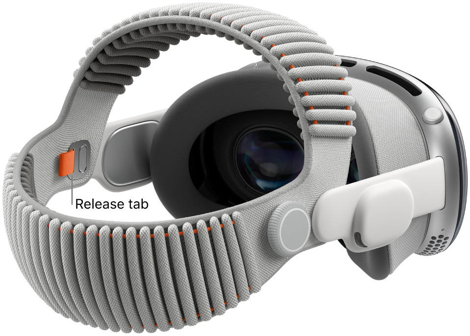 Apple&nbsp;Vision&nbsp;Pro with the Dual Knitted Band attached. An orange release tab is visible on the inside of the Dual Knitted Band.