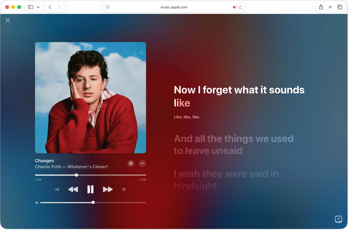 A song is playing in the Full Screen Player in Apple Music. Lyrics appear on the right, in time with the music.