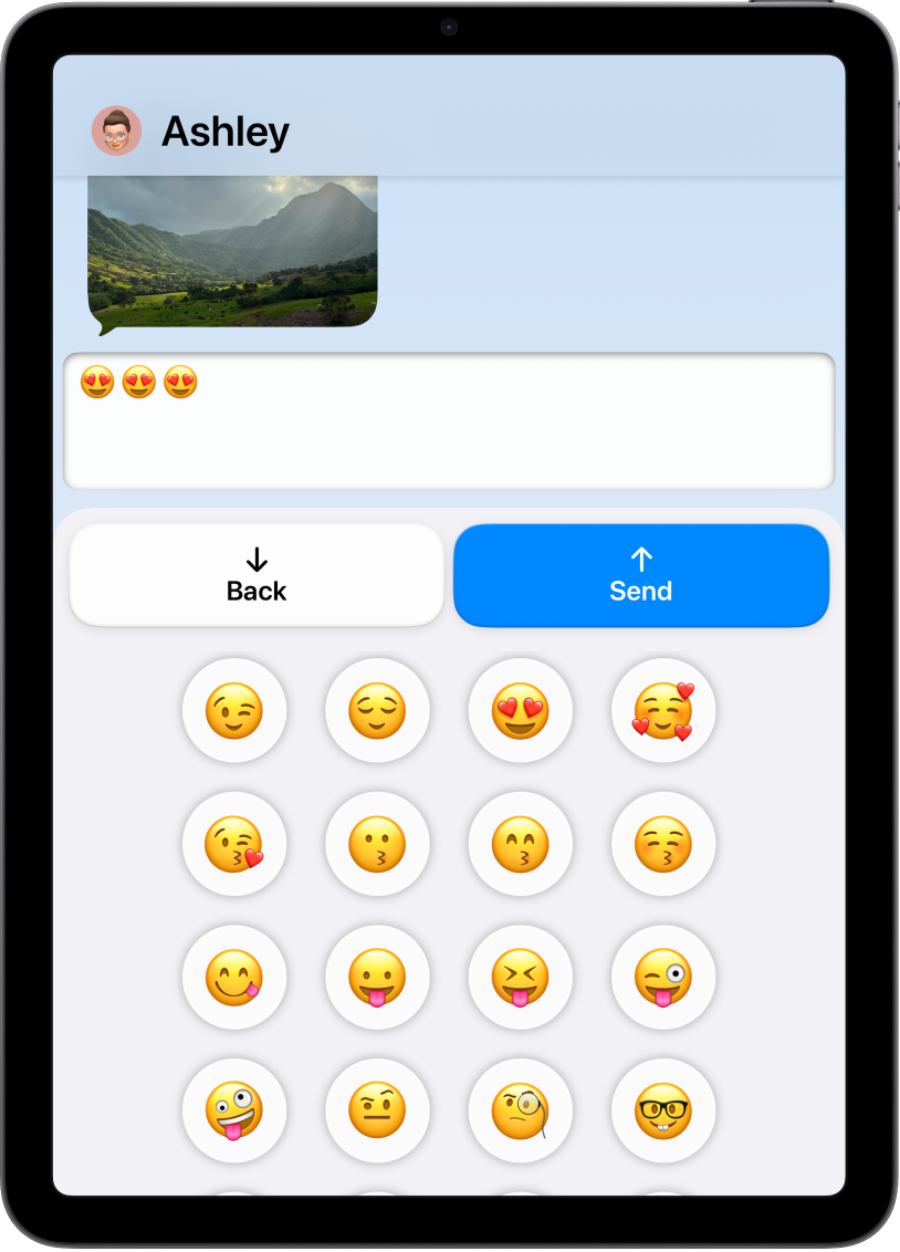 An iPad in Assistive Access with the Messages app open. A message is being sent using an emoji-only keyboard.