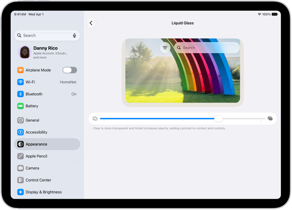 The Liquid Glass screen in Settings. In the middle of the screen is a slider to increase or decrease the level of Liquid Glass transparency. 
