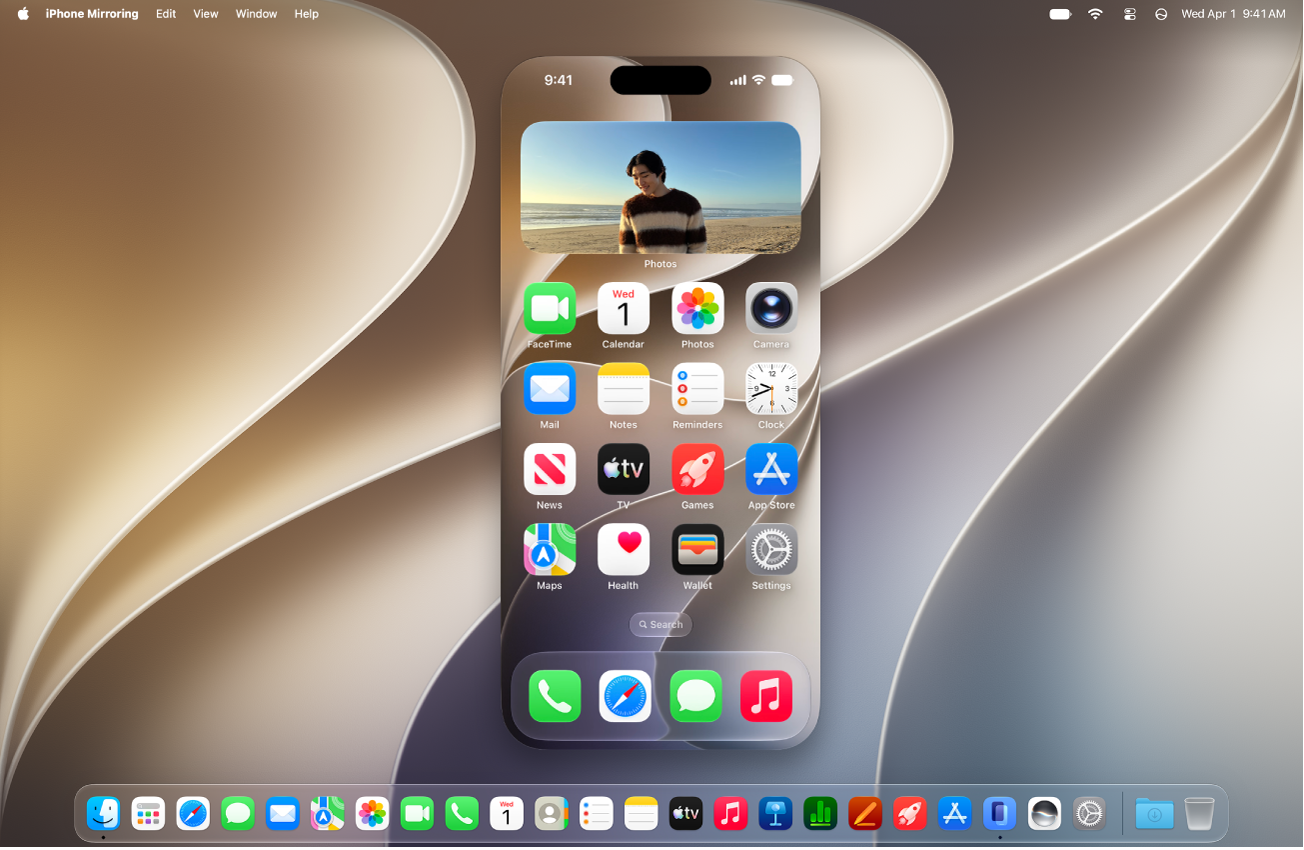 The iPhone Mirroring app appears on a Mac computer desktop.