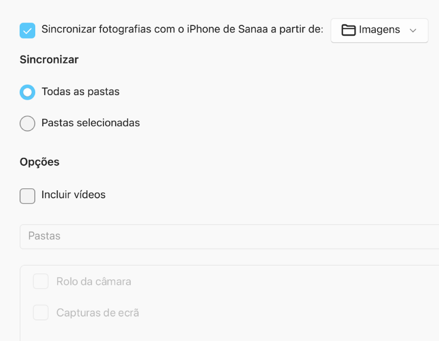 Os botões de seleção “Todas as fotografias e álbuns” e “Álbuns selecionados” aparecem com as opções assinaláveis “Só favoritas”, “Incluir vídeos” e “Incluir automaticamente fotografias de” por baixo.