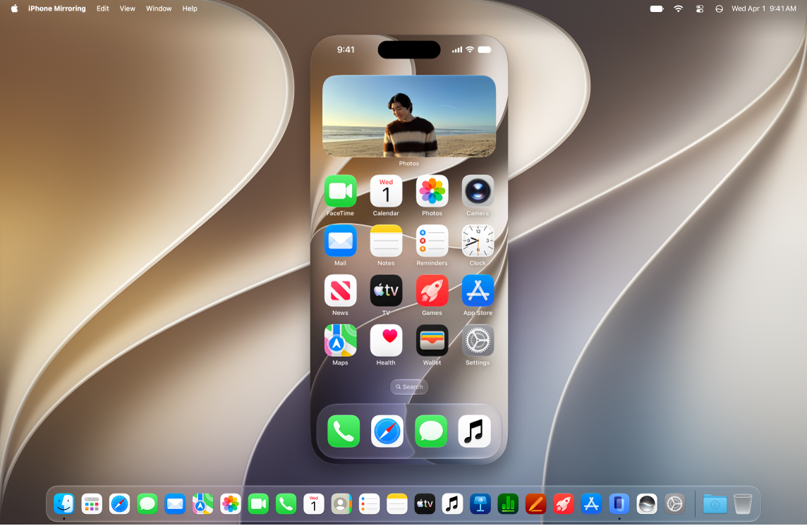 The iPhone Mirroring app appears on a Mac computer desktop.