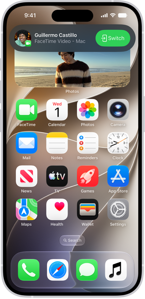 The iPhone Home Screen showing a FaceTime video call notification from an iPad at the top. Tap the Switch button to the right of the notification to
move the call to your iPhone