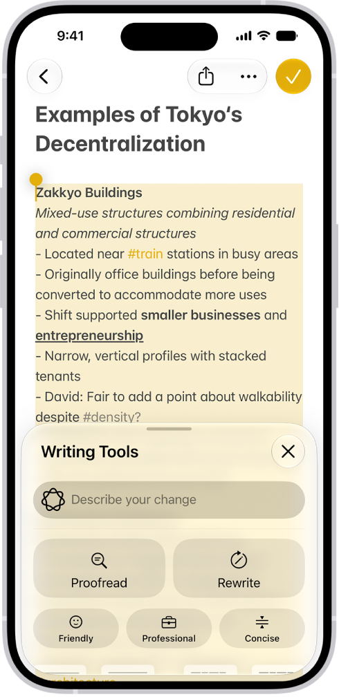 An iPhone showing highlighted text at the top of the screen and the Writing Tools pane at the bottom. The Writing Tools pane shows a field at the top where you describe the change you want. Writing Tools options appear below.