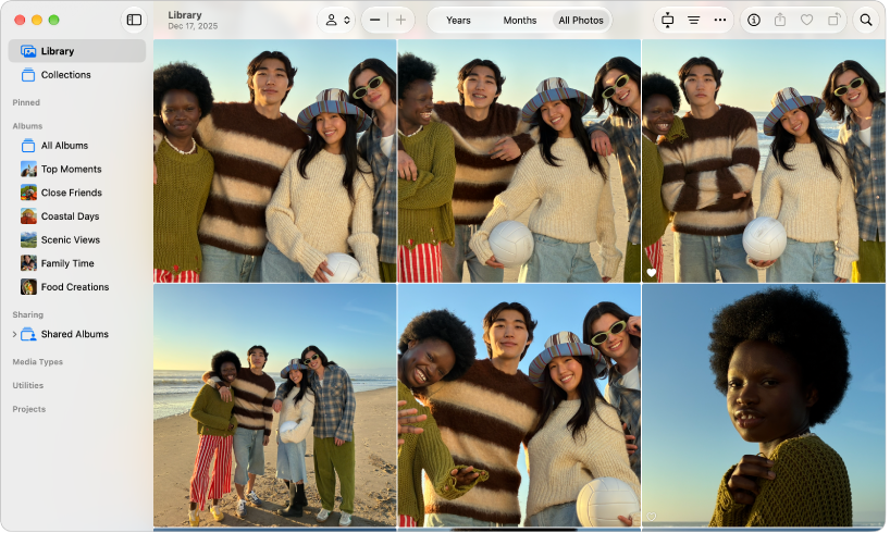 The Photos main window showing Library selected in the sidebar on the left, photos in a grid on the right, and the toolbar at the top.