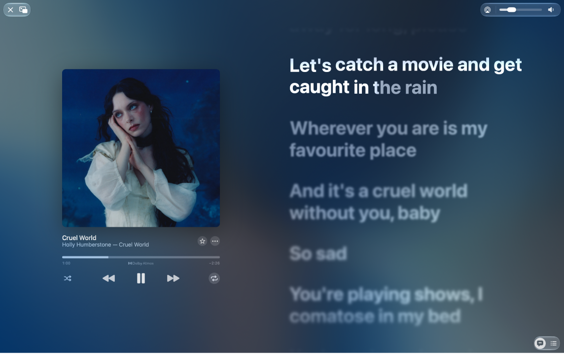 The Full Screen Player with a song playing and lyrics on the right, which appear onscreen in time with the music.