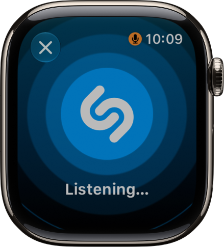 A screen showing the title and artist of a song identified by Music Recognition. The play button is at the bottom right.