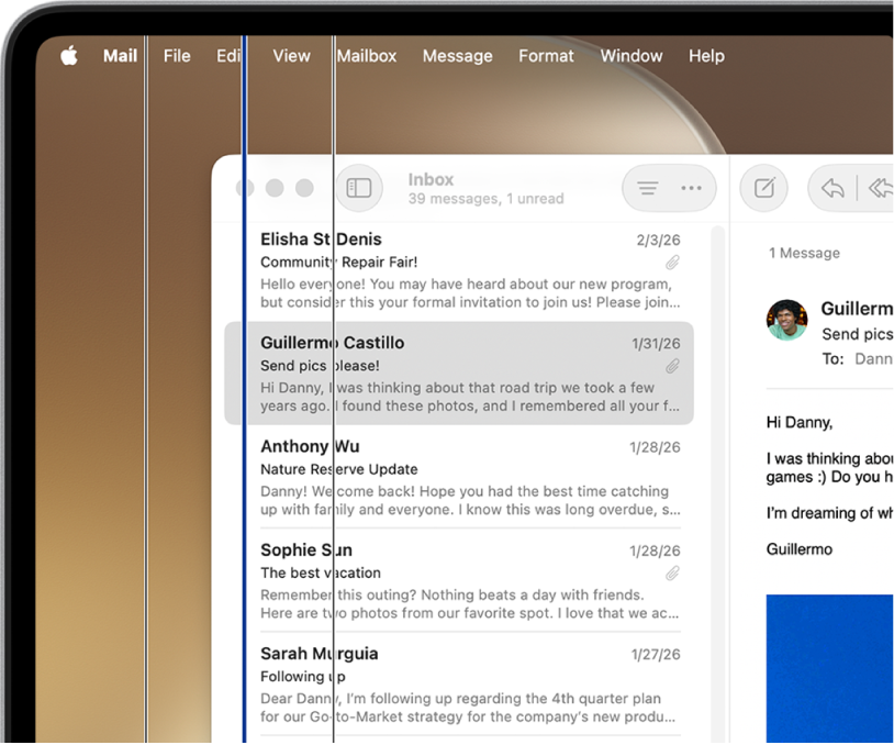 L’app Mail est ouverte sur le bureau. Des lignes verticales sont superposées à l’écran.