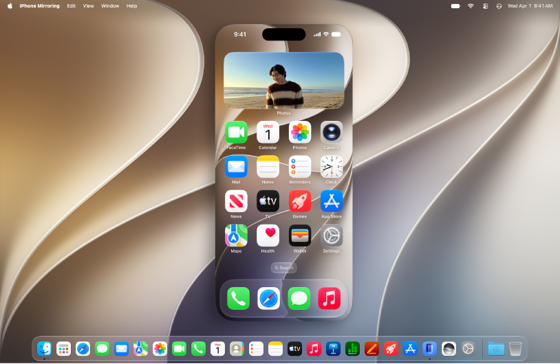 The iPhone Mirroring app appears on a Mac computer desktop.
