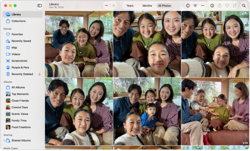 A Photos app window showing a grid of photos in the Library view, with a sidebar for browsing albums, collections, and more.