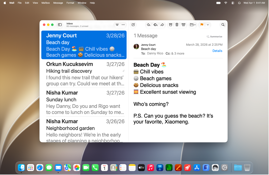 The Mail window is open on the desktop. Emails are displayed with large text.