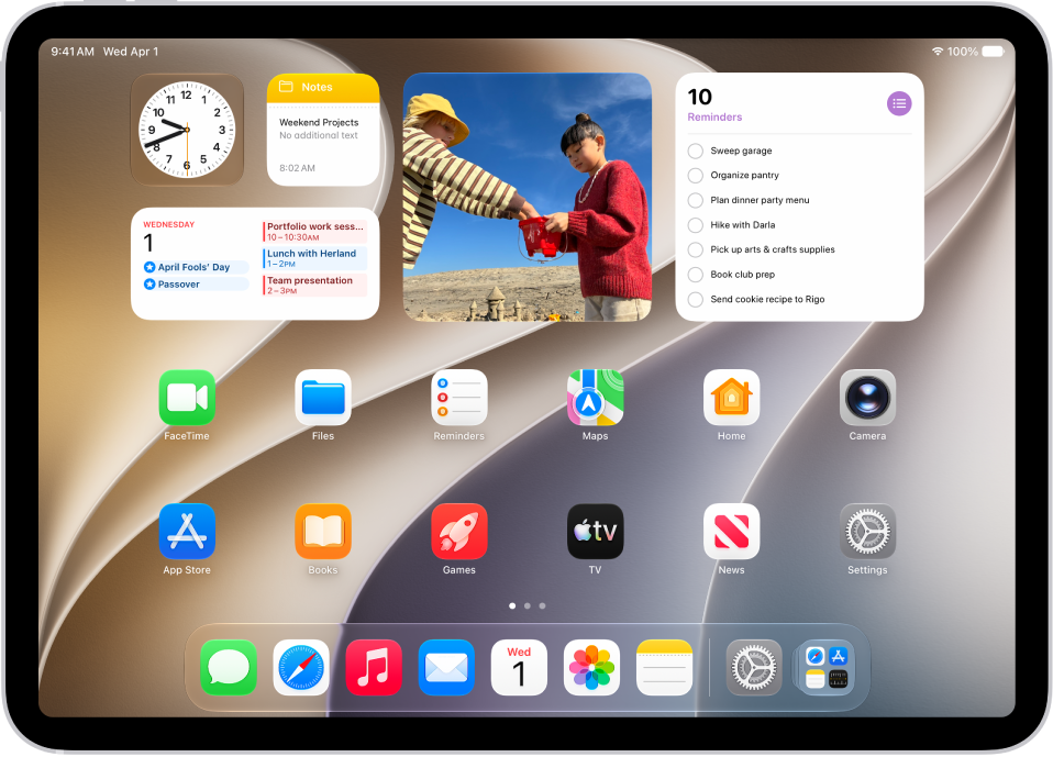 The Home Screen with the Dock showing six favorite apps on the left and three suggested apps to the right. The rightmost icon in the Dock opens App Library.