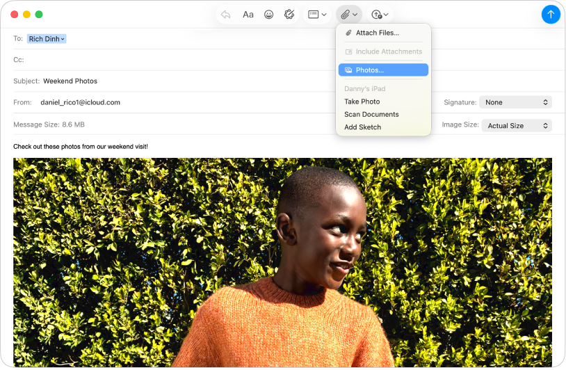 Ein Fenster der App „Mail“, das eine E-Mail und die Menüoptionen für „Fotoübersicht“ anzeigt.