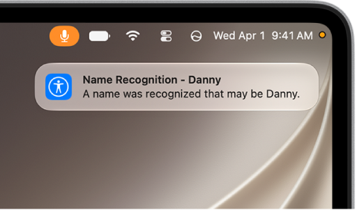 A notification on the Mac desktop says your Mac recognized a sound that may be a name.
