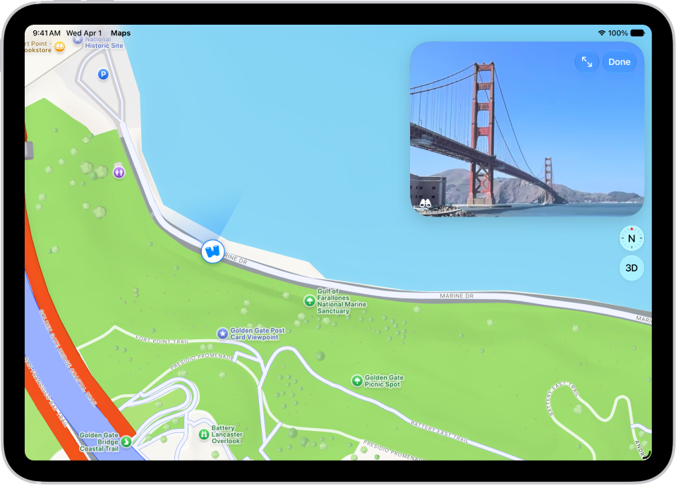 Eine verschiebbare 360°-Panoramaansicht wird über der Karte eines Gebiets, das in der App „Karten“ markiert ist, angezeigt. In Blickrichtung wird das Symbol „Umsehen“ auf den Kartenpunkten überlagert.