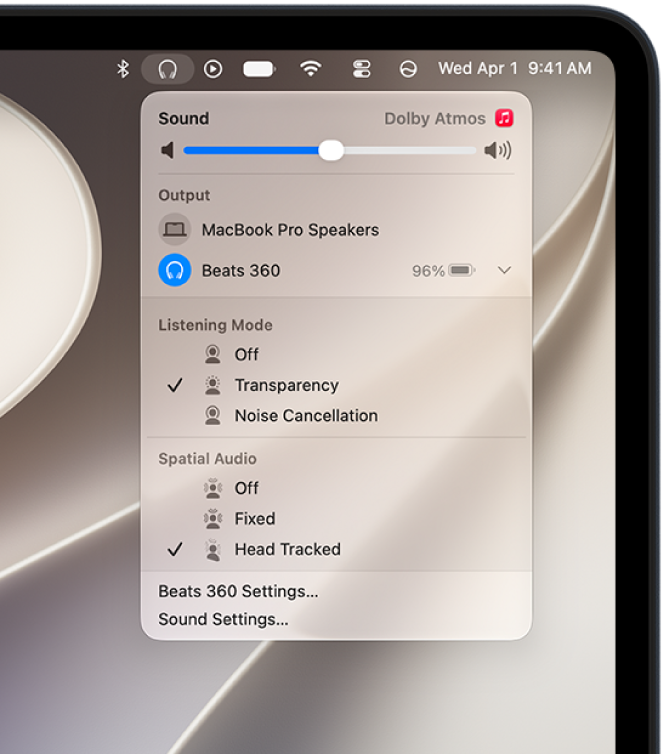 The Beats icon selected in the menu bar on Mac. A menu shows Powerbeats&nbsp;Pro&nbsp;2 with Transparency and Head Tracked Spatial Audio on.