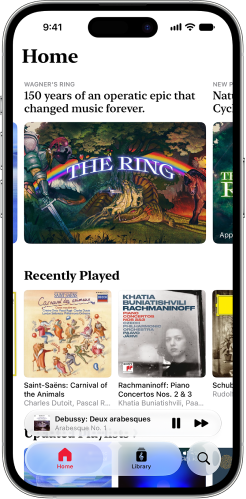 An iPhone showing the Home tab in Apple Music Classical. At the top of the screen is a featured playlist. Recently Played playlists are in the middle of the screen, and below those is the MiniPlayer, which shows the track that’s currently playing. At the very bottom of the screen are the Home, Library, and Search buttons.