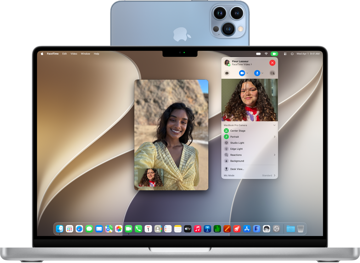 A MacBook Pro using an iPhone as a webcam and showing a FaceTime call.