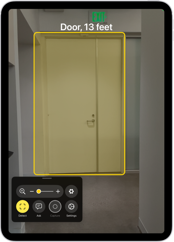The Magnifier app is open and a door is being detected. A description shows how far away the door is.