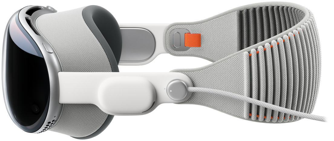 Vue latérale de l’Apple&nbsp;Vision&nbsp;Pro sur lequel est fixé le bandeau tissé solo. La batterie est connectée à la bande audio gauche.